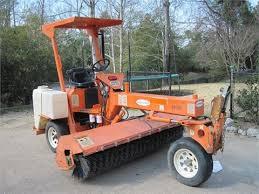 Using A Sweeper To Remove Gravel From Grass & Lawns - or parking lots