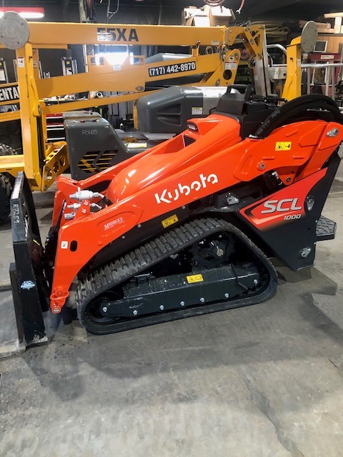 .Ditch Witch SK800 Mini Track Stand On Loader Rent. Kubota SCL1000 4