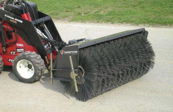 Sweeper for Stand On Loader Attachment Rental 1